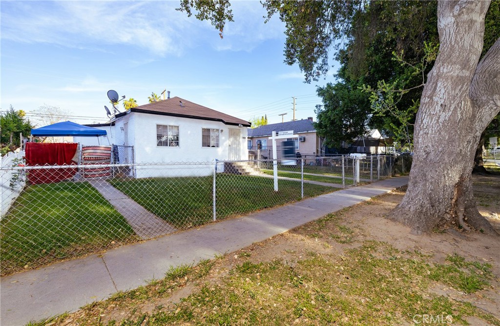 4156 Dwight Avenue Riverside, CA 92507 - Photo 7 of 8 a view of a house with a yard