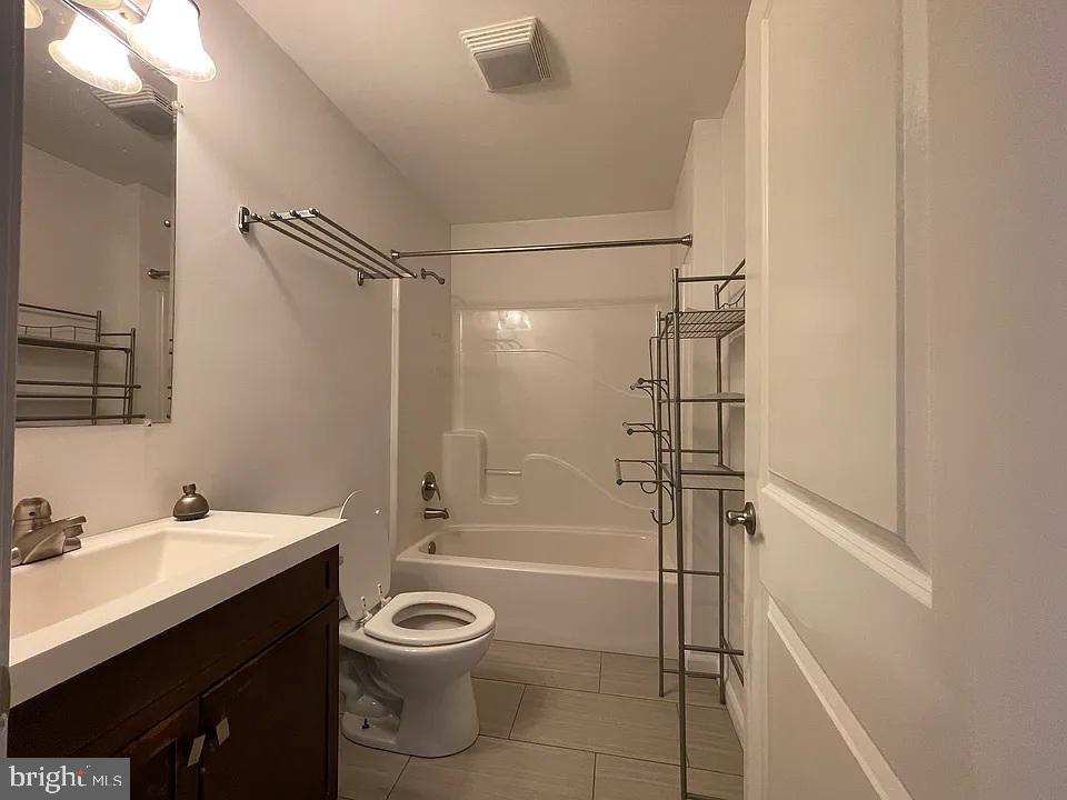 1002 Fairmount Avenue Philadelphia, PA 19123 - Photo 10 of 17 a bathroom with a sink toilet vanity and shower