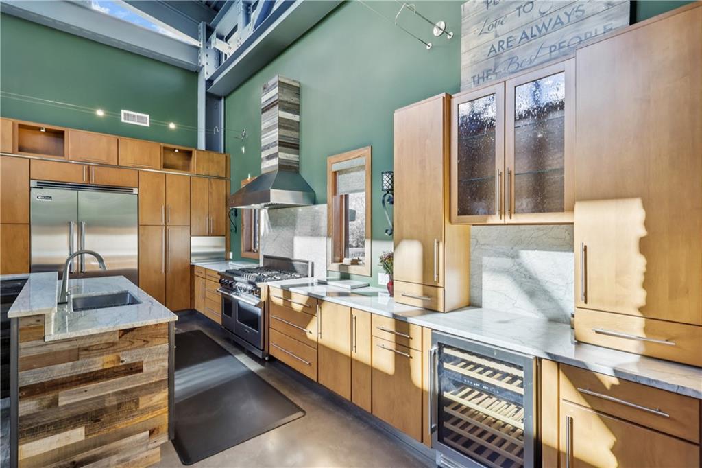 461 Dutchman Run Road New Kensington, PA 15068 - Photo 15 of 50 a kitchen with stainless steel appliances granite countertop sink stove and cabinets