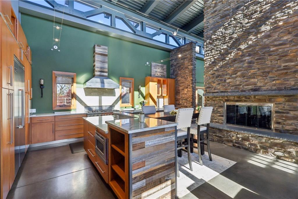 461 Dutchman Run Road New Kensington, PA 15068 - Photo 16 of 50 a view of a kitchen with outdoor seating