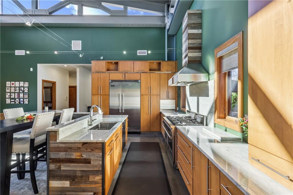 461 Dutchman Run Road New Kensington, PA 15068 - Photo 19 of 50 a large kitchen with stainless steel appliances granite countertop a sink and a stove