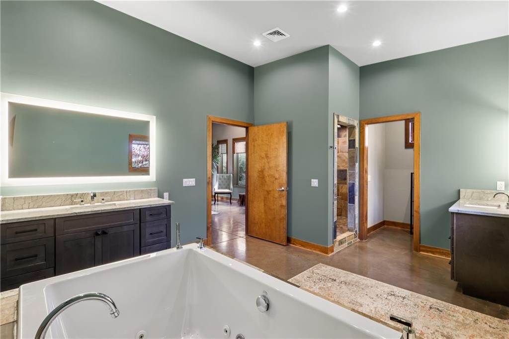 461 Dutchman Run Road New Kensington, PA 15068 - Photo 33 of 50 a spacious bathroom with a granite countertop sink mirror and bathtub