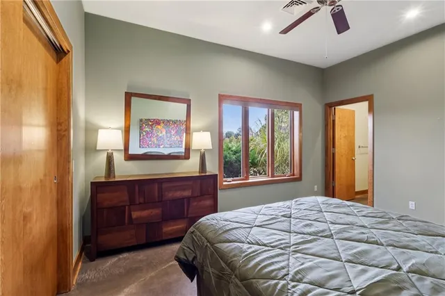 a roof deck with a table and chairs