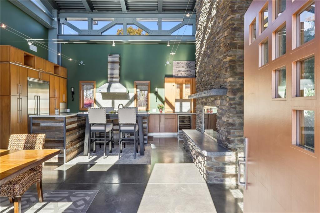 461 Dutchman Run Road New Kensington, PA 15068 - Photo 4 of 50 a view of a patio with couches table and chairs and potted plants