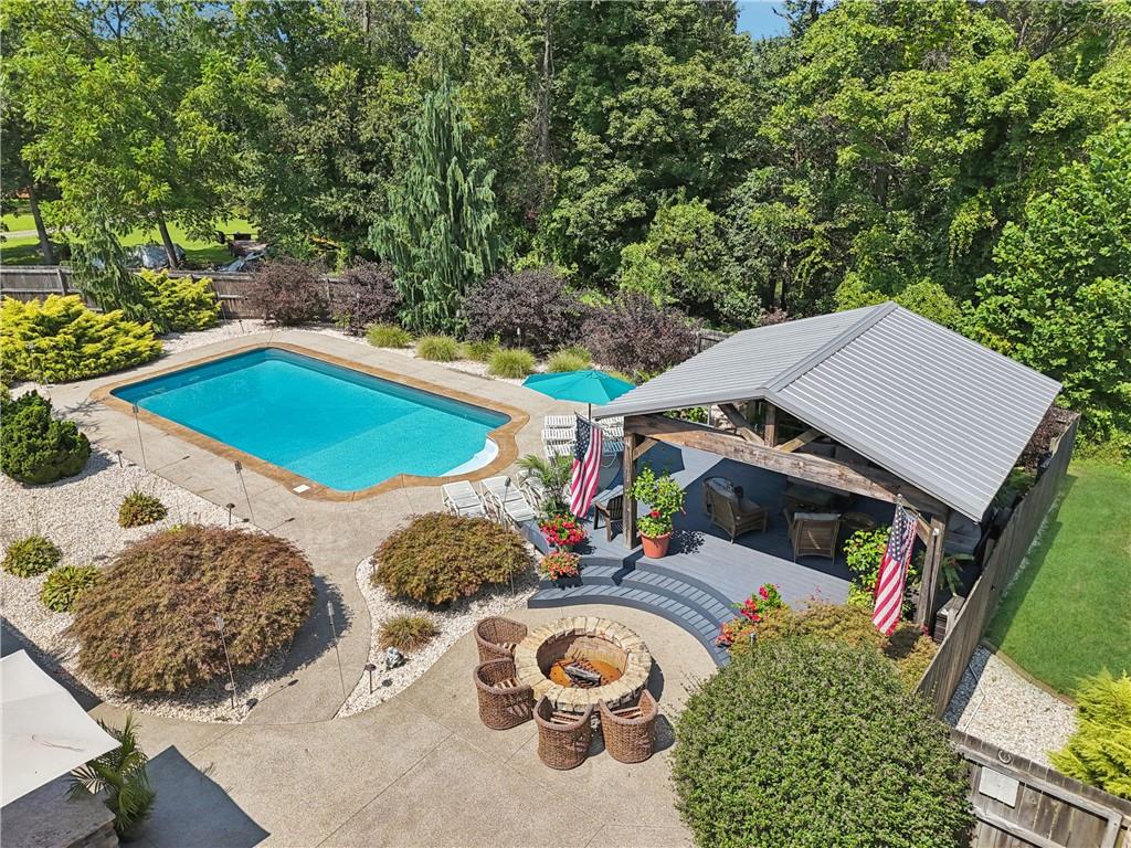 461 Dutchman Run Road New Kensington, PA 15068 - Photo 48 of 50 an aerial view of a house with swimming pool and trees
