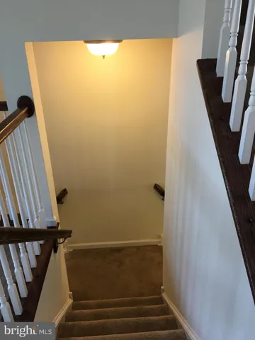 a view of an entryway with stairs