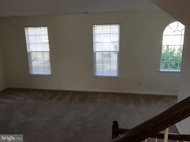 a kitchen with a sink and a toilet