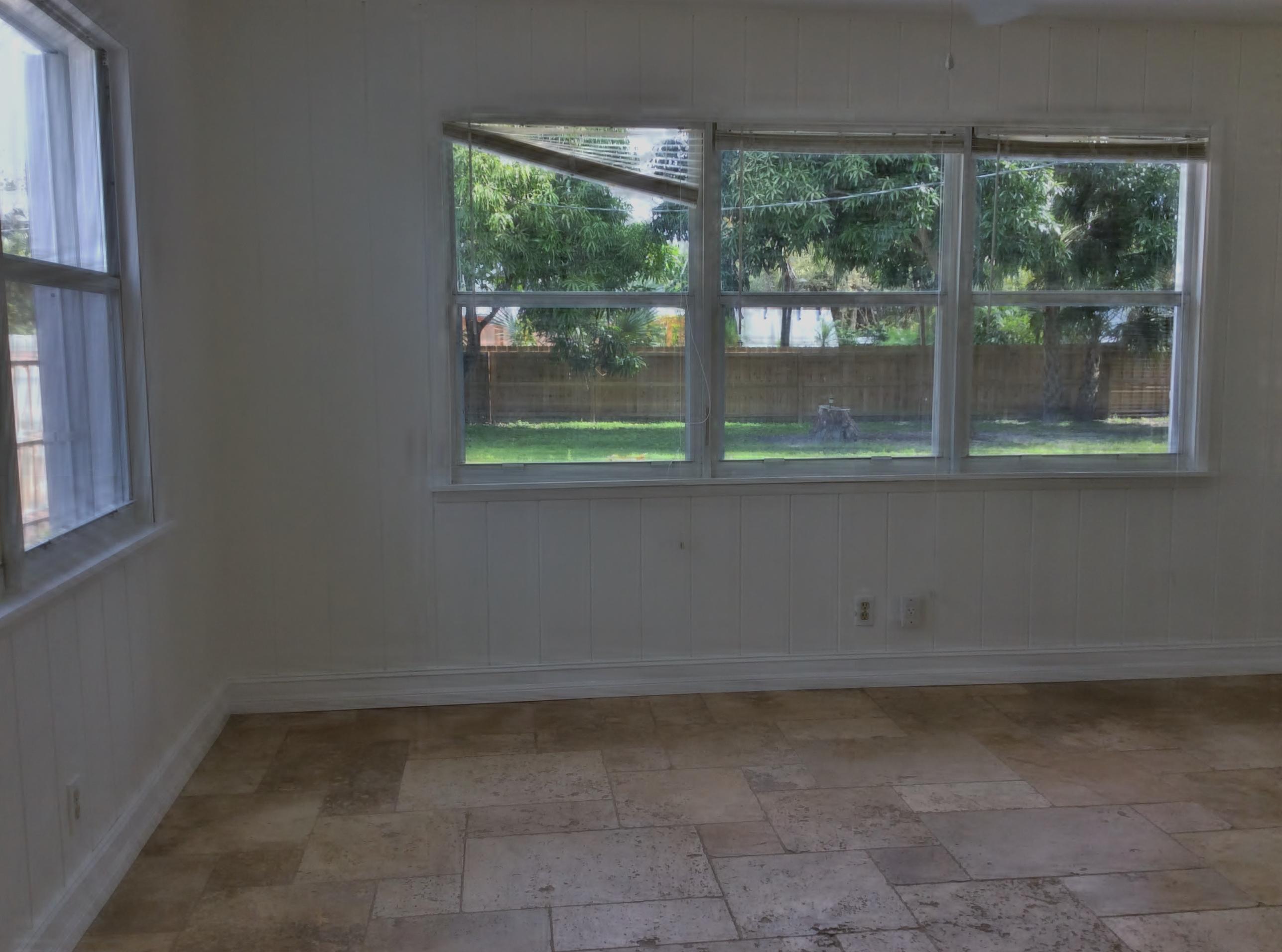 950 Northwest Boca Raton Boulevard Boca Raton, FL 33432 - Photo 8 of 19 Family Room Overlooks Back Yard