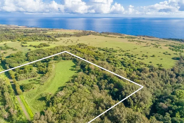 a view of an pool and an outdoor seating