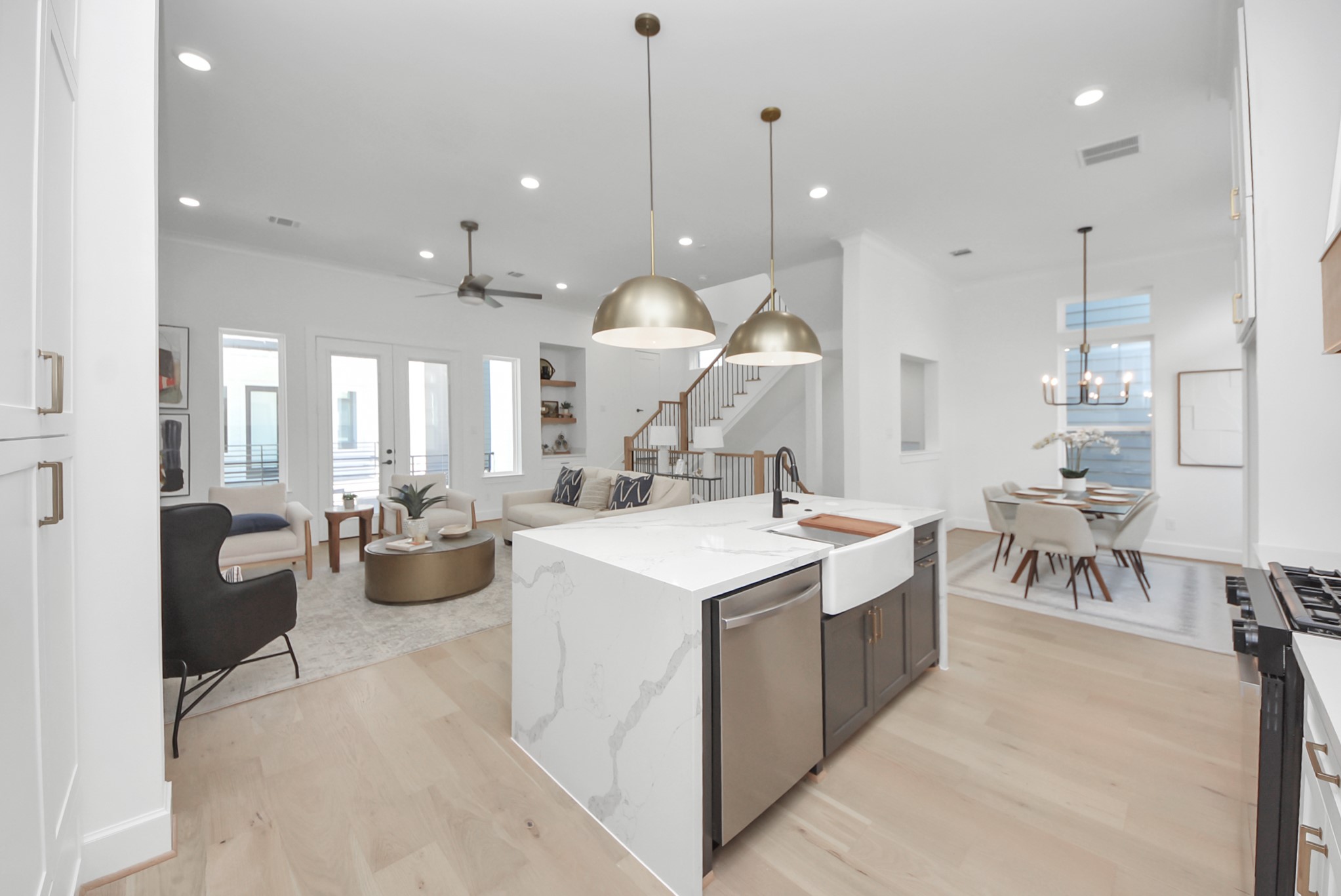 923 Fisher Street, Unit B Houston, TX 77018 - Photo 12 of 47 a living room with stainless steel appliances kitchen island a table chairs and a sink