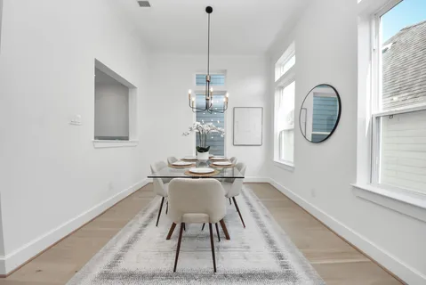 a dining room with table and chair