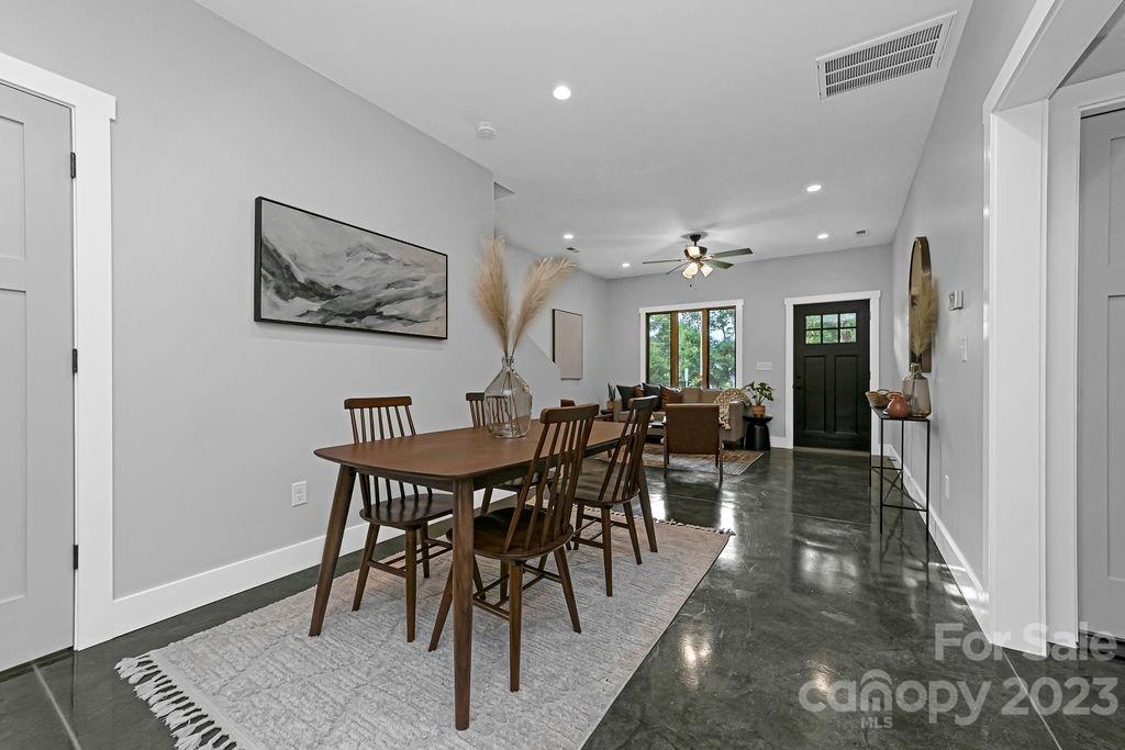 183 Neely Road Brevard, NC 28712 - Photo 13 of 44 a view of a dining room with furniture