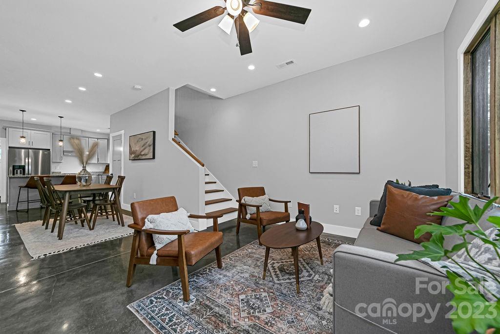 183 Neely Road Brevard, NC 28712 - Photo 15 of 44 a living room with furniture and a potted plant