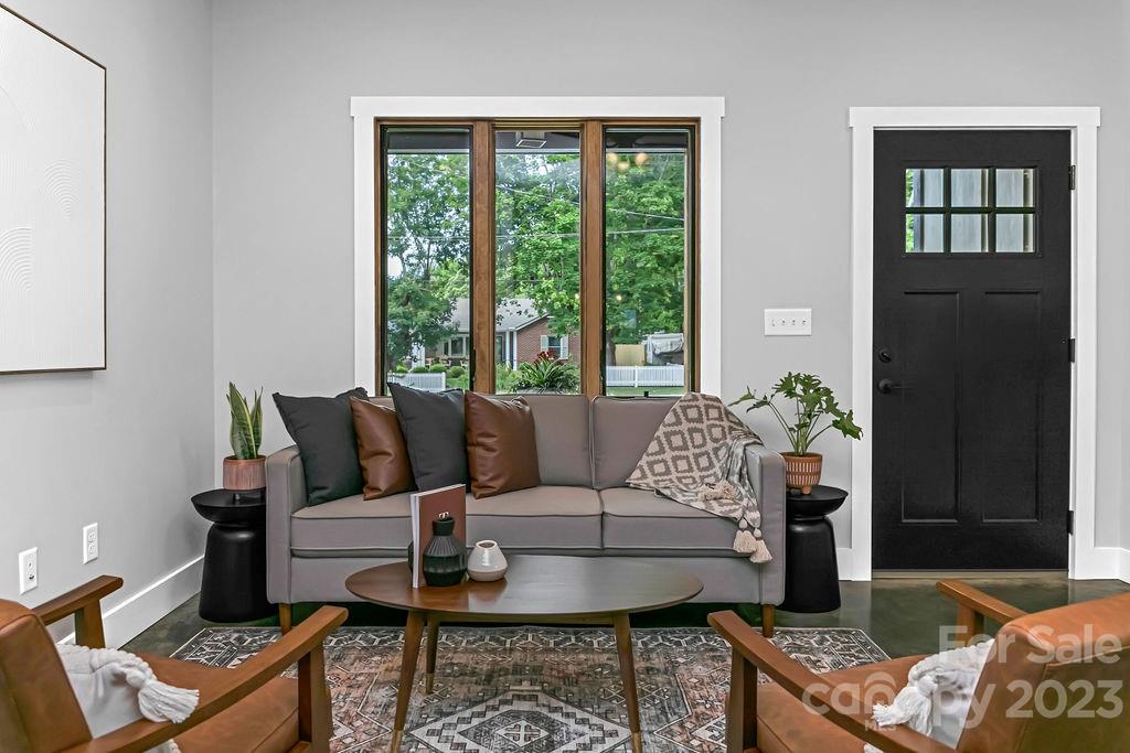 183 Neely Road Brevard, NC 28712 - Photo 16 of 44 a living room with furniture and a window