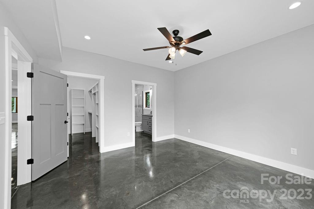 183 Neely Road Brevard, NC 28712 - Photo 22 of 44 a view of empty room with wooden floor