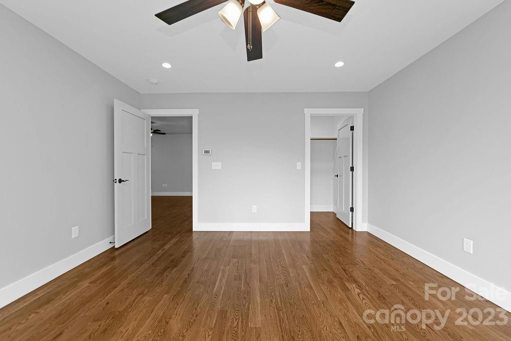 183 Neely Road Brevard, NC 28712 - Photo 38 of 44 a view of an empty room with wooden floor
