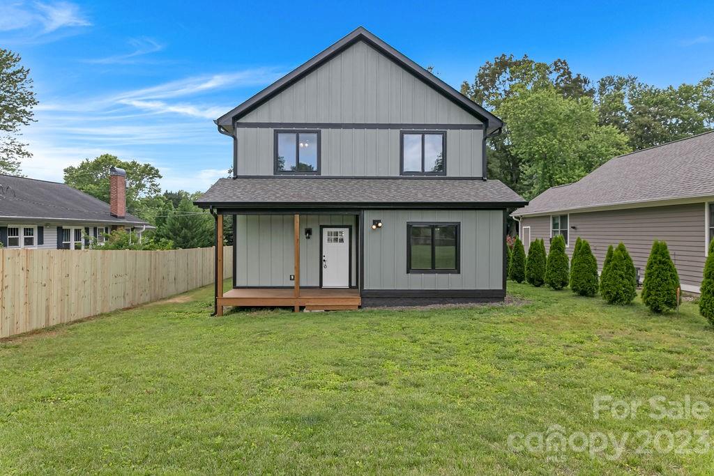 183 Neely Road Brevard, NC 28712 - Photo 41 of 44 front view of a house with a yard