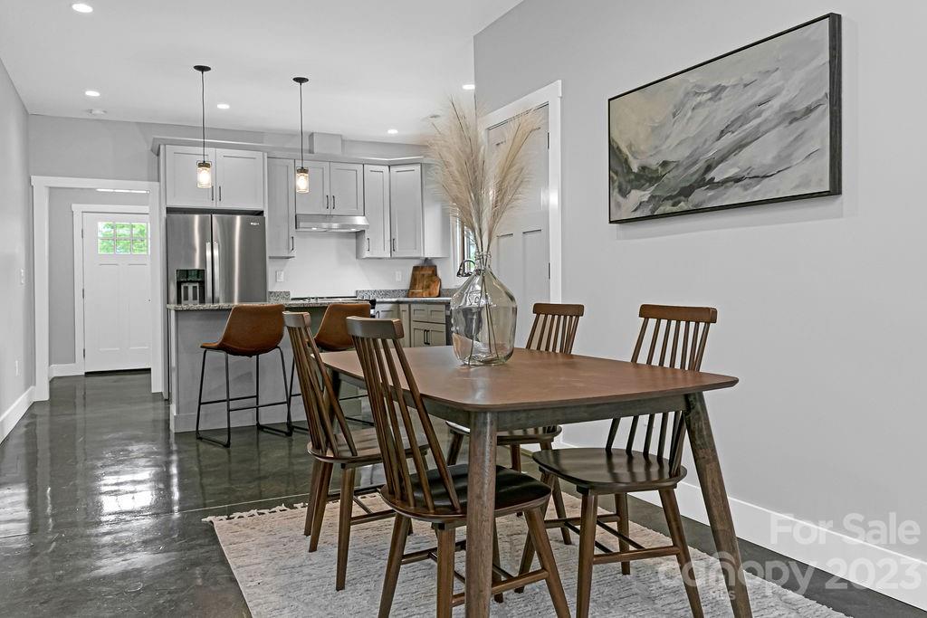 183 Neely Road Brevard, NC 28712 - Photo 5 of 44 a view of a dining room with furniture