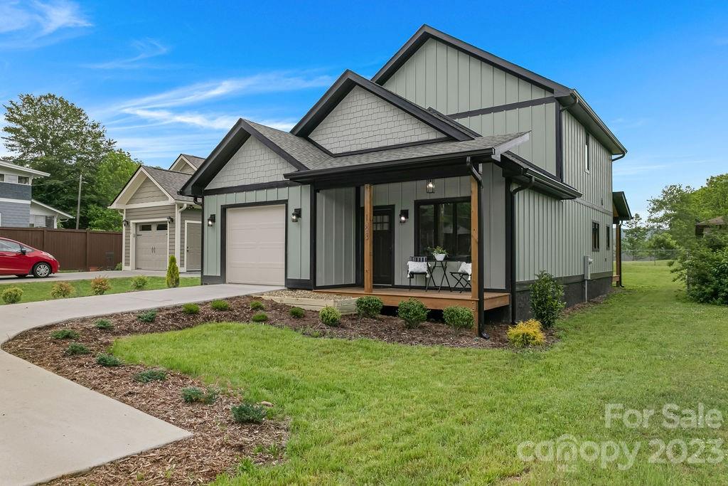 183 Neely Road Brevard, NC 28712 - Photo 6 of 44 front view of a house with a yard