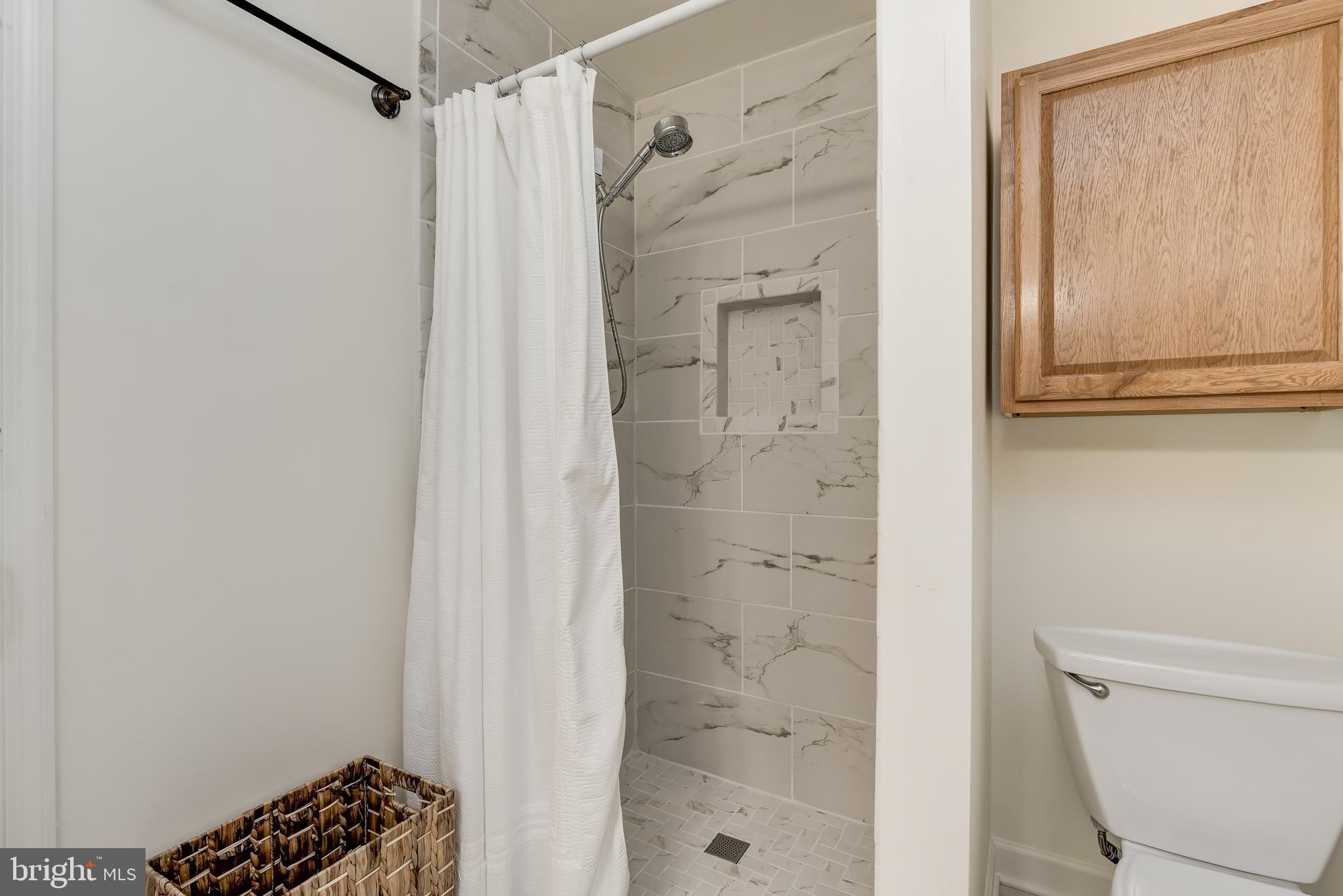 709 Black Forest Road Annapolis, MD 21409 - Photo 25 of 49 Modern tiled walk in shower