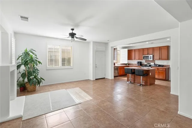 a view of kitchen with furniture and window
