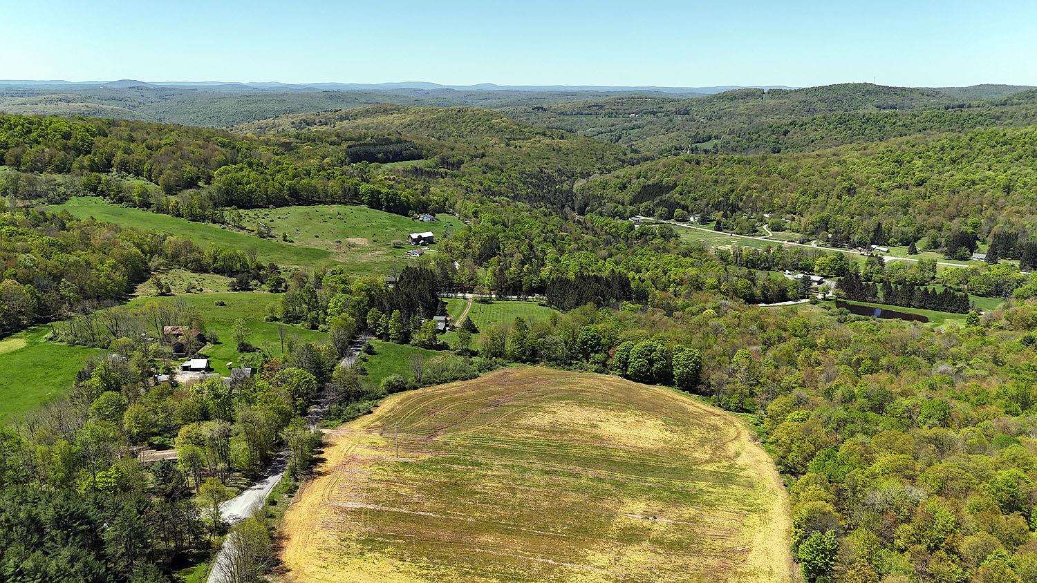 Drone / aerial view of a heavily wooded area