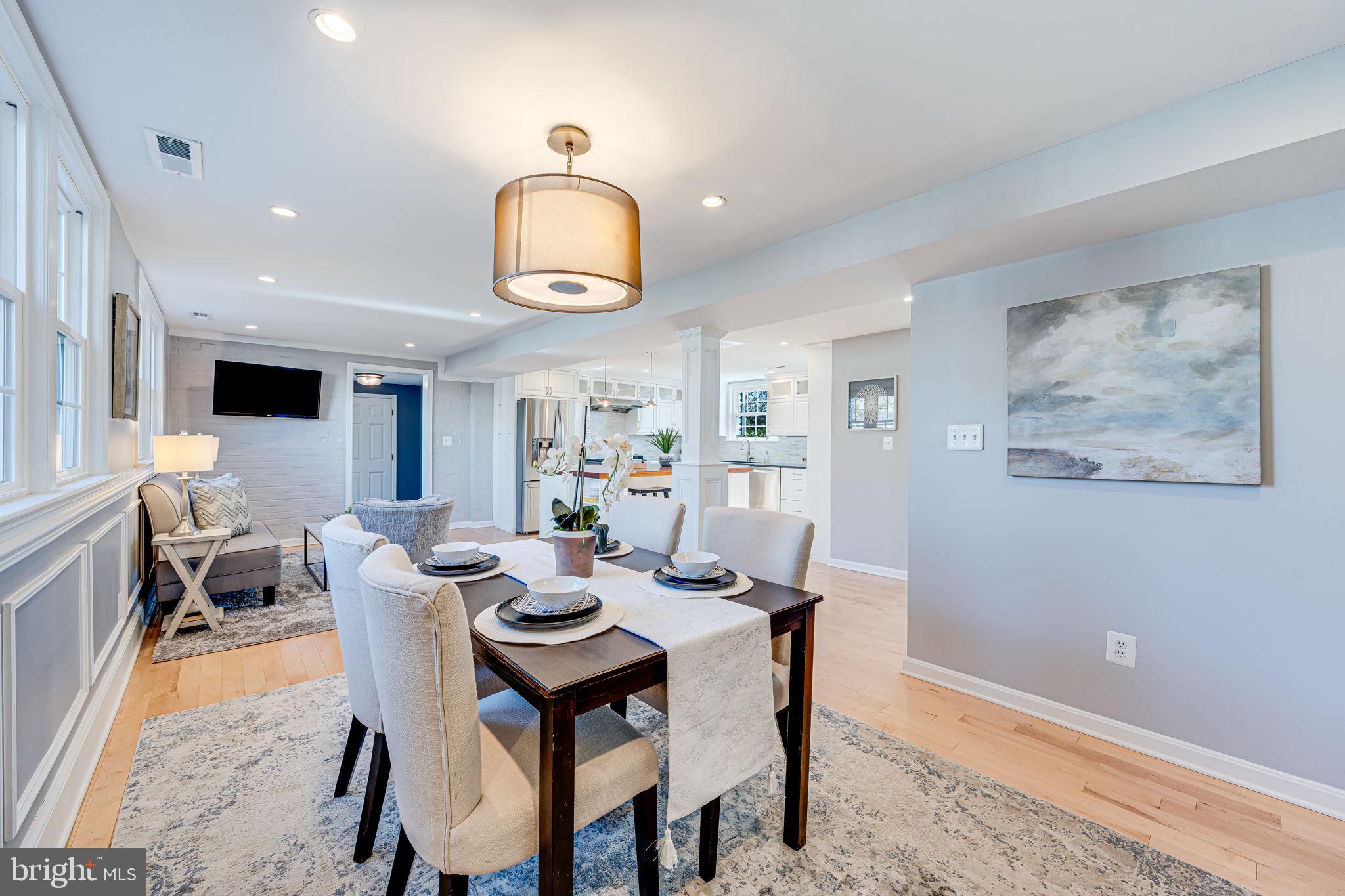 1122 Waynewood Boulevard Alexandria, VA 22308 - Photo 15 of 51 a view of a dining room with furniture