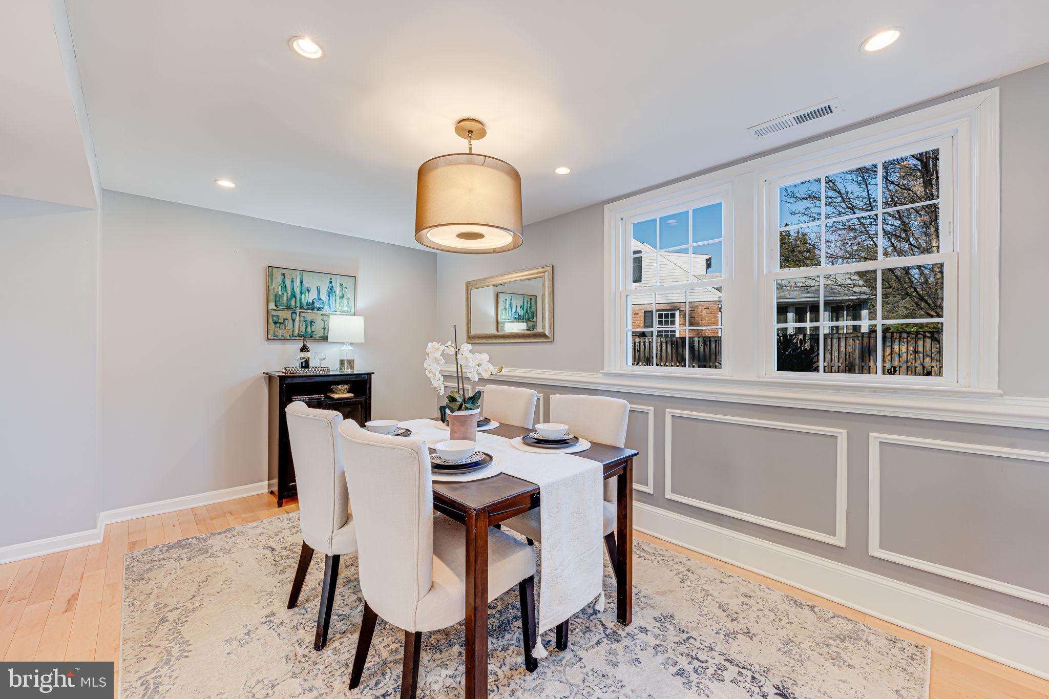 1122 Waynewood Boulevard Alexandria, VA 22308 - Photo 16 of 51 a view of a dining room with furniture