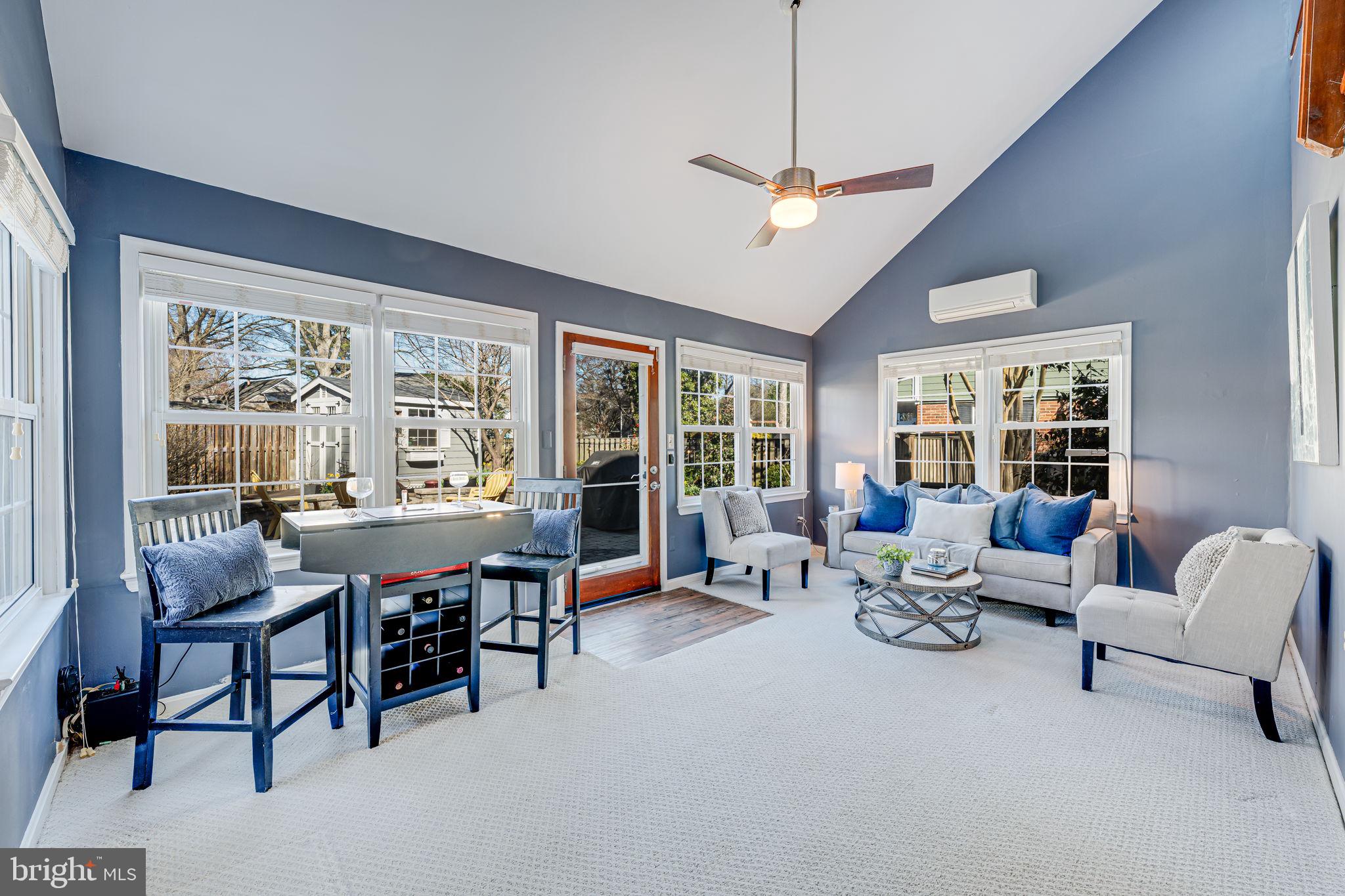1122 Waynewood Boulevard Alexandria, VA 22308 - Photo 19 of 51 a living room with furniture and a large window