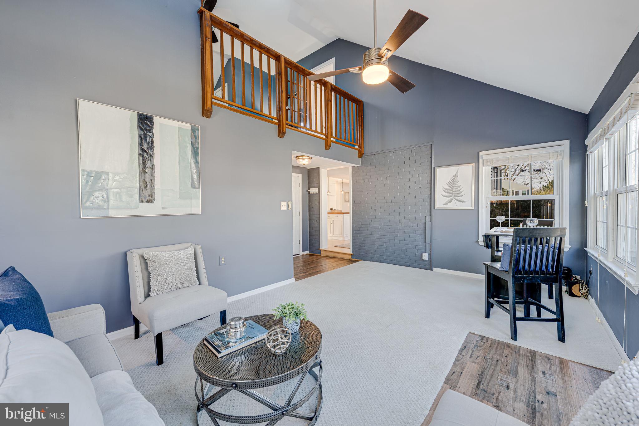 1122 Waynewood Boulevard Alexandria, VA 22308 - Photo 20 of 51 a bedroom with furniture and a large window
