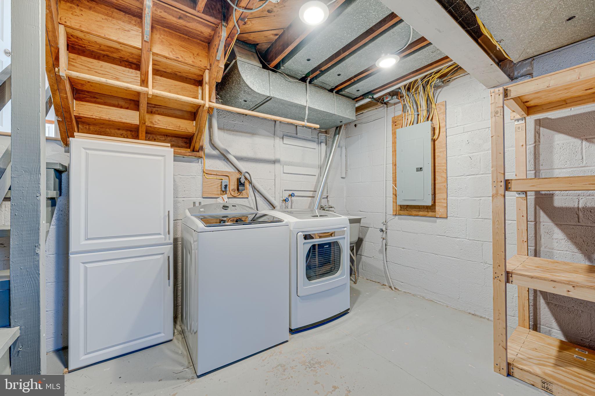 1122 Waynewood Boulevard Alexandria, VA 22308 - Photo 32 of 51 a utility room with dryer and washer
