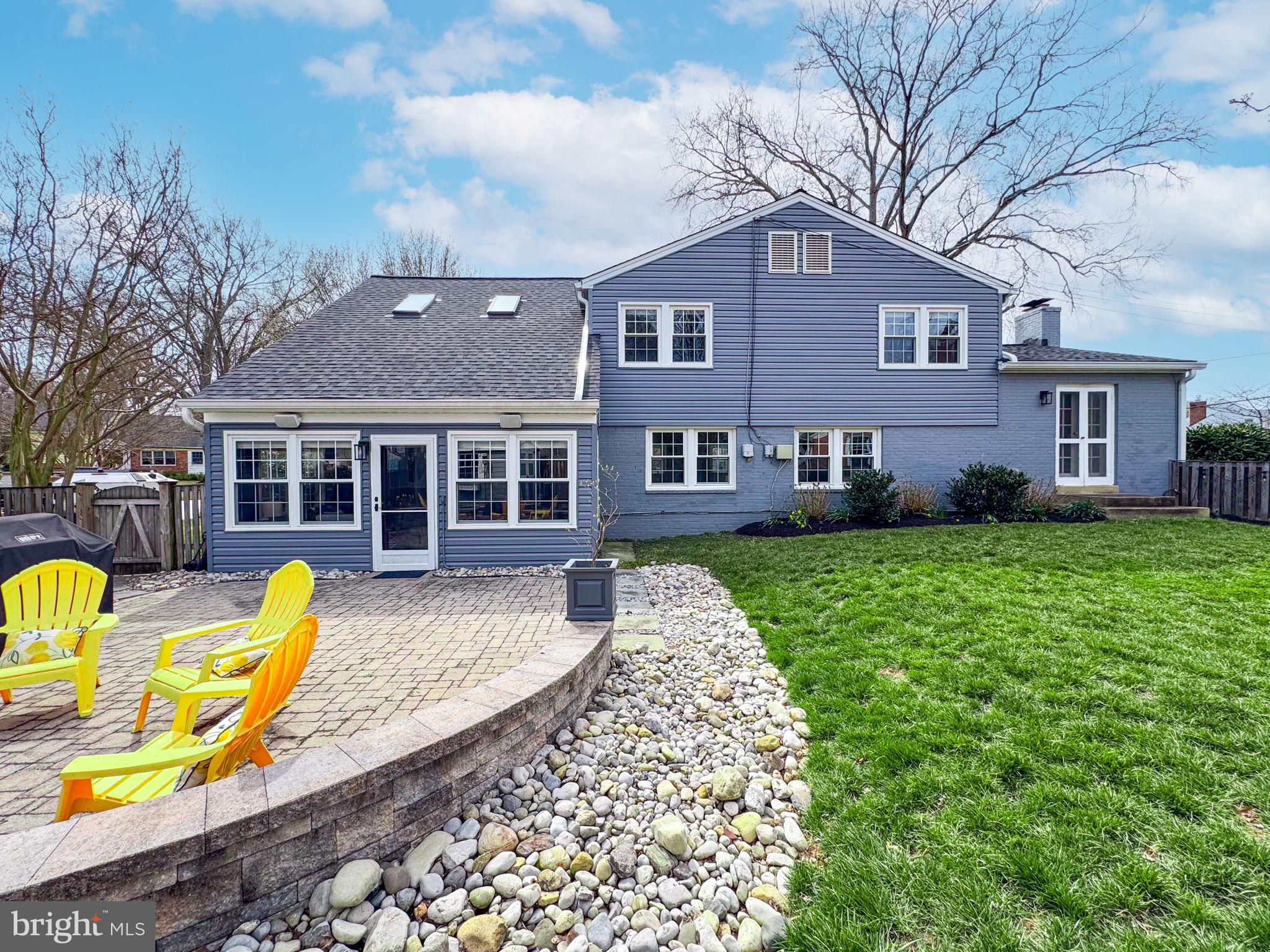 1122 Waynewood Boulevard Alexandria, VA 22308 - Photo 35 of 51 a front view of a house with garden