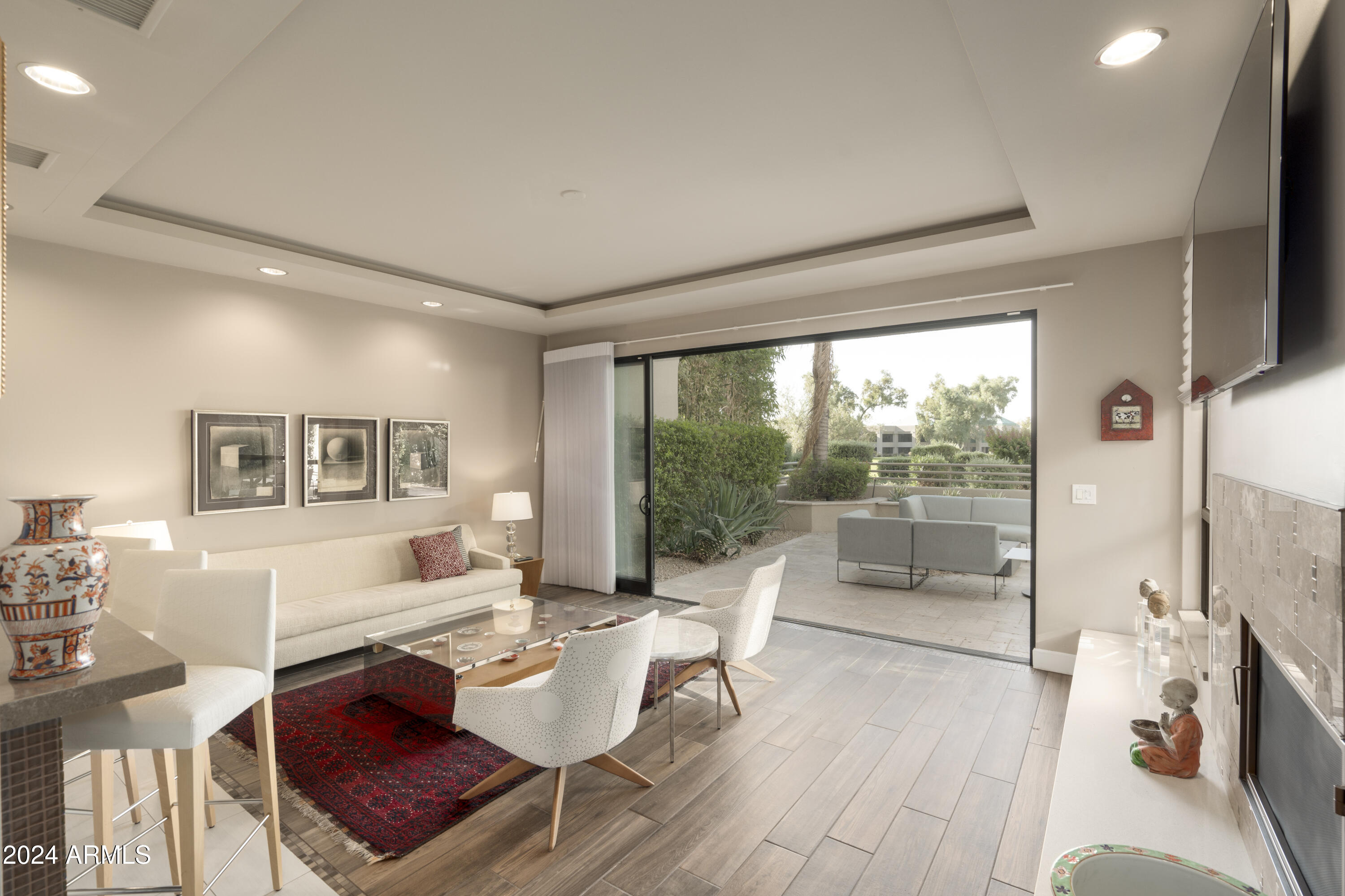7760 East Gainey Ranch Road, Unit 13 Scottsdale, AZ 85258 - Photo 5 of 21 7760 #13 Doors Living room-2HDR