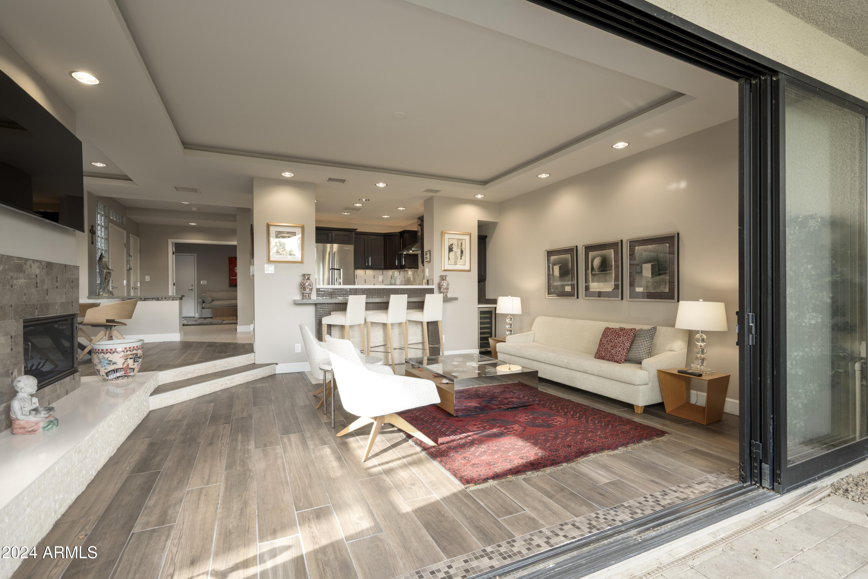 7760 East Gainey Ranch Road, Unit 13 Scottsdale, AZ 85258 - Photo 6 of 21 7760 #13 Doors Living room-HDR