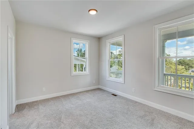 an empty room with a bathroom