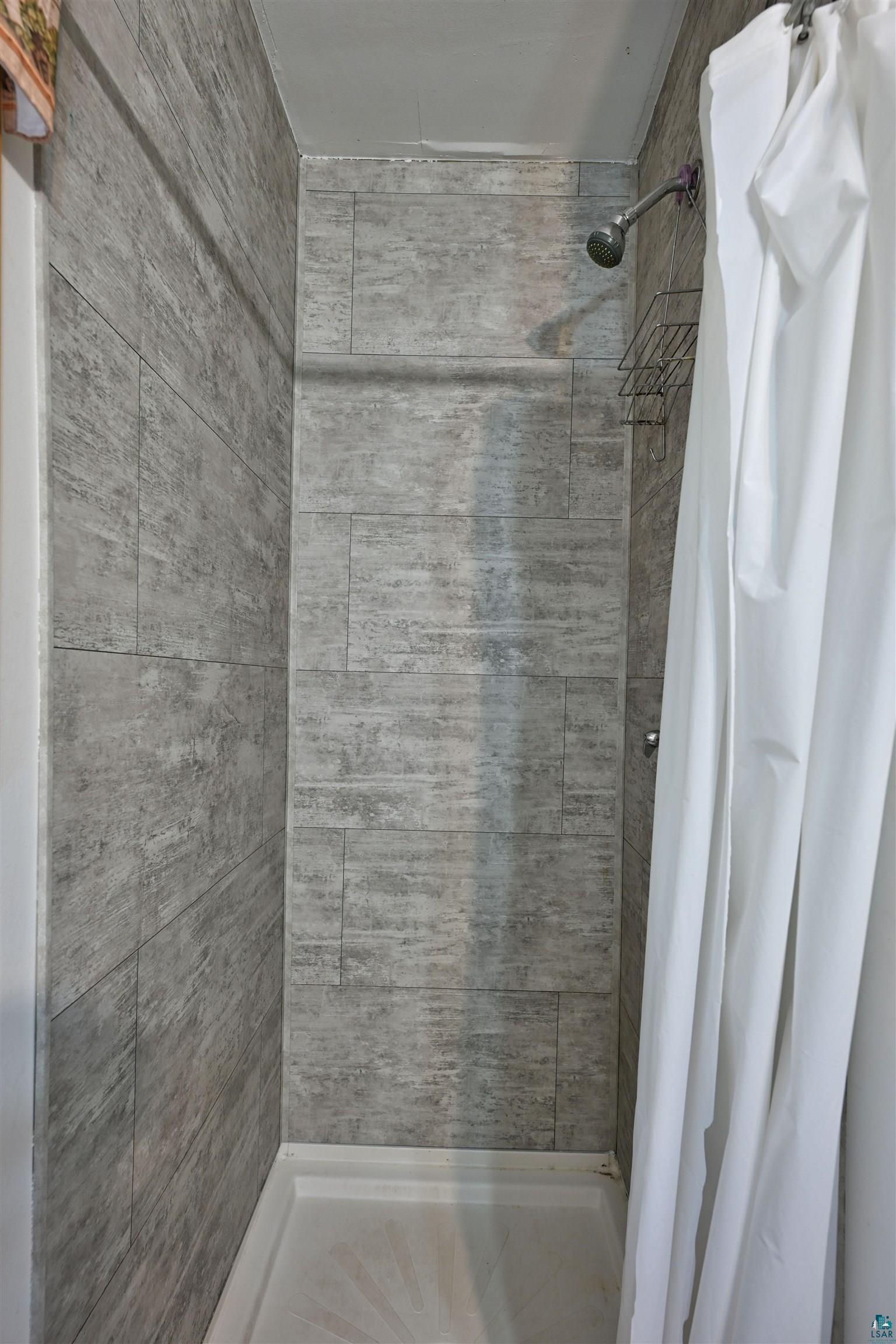 6833 View Point Lodge Road Gordon, WI 54838 - Photo 21 of 40 Full bath featuring a shower stall