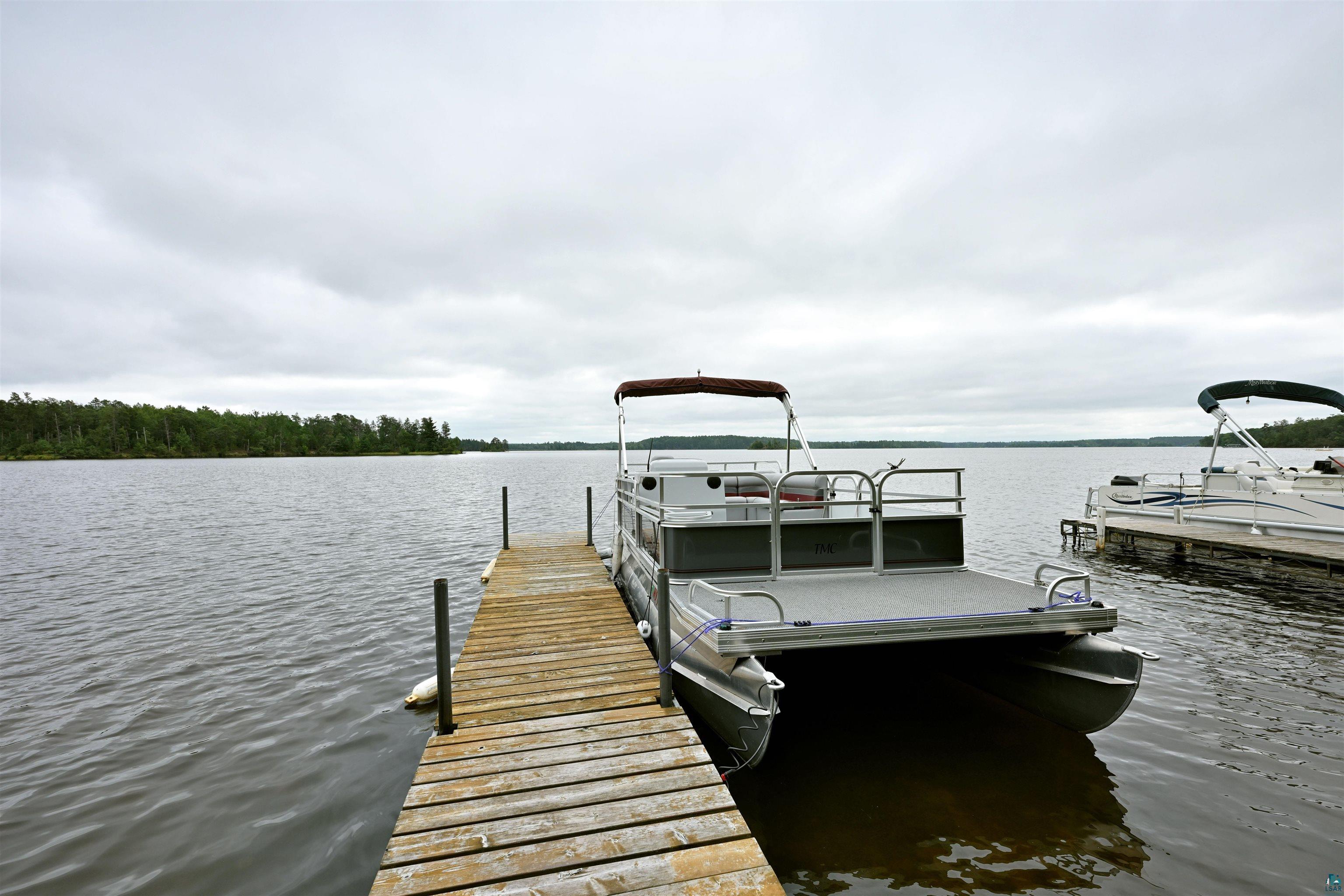 6833 View Point Lodge Road Gordon, WI 54838 - Photo 36 of 40 Dock featuring a water view