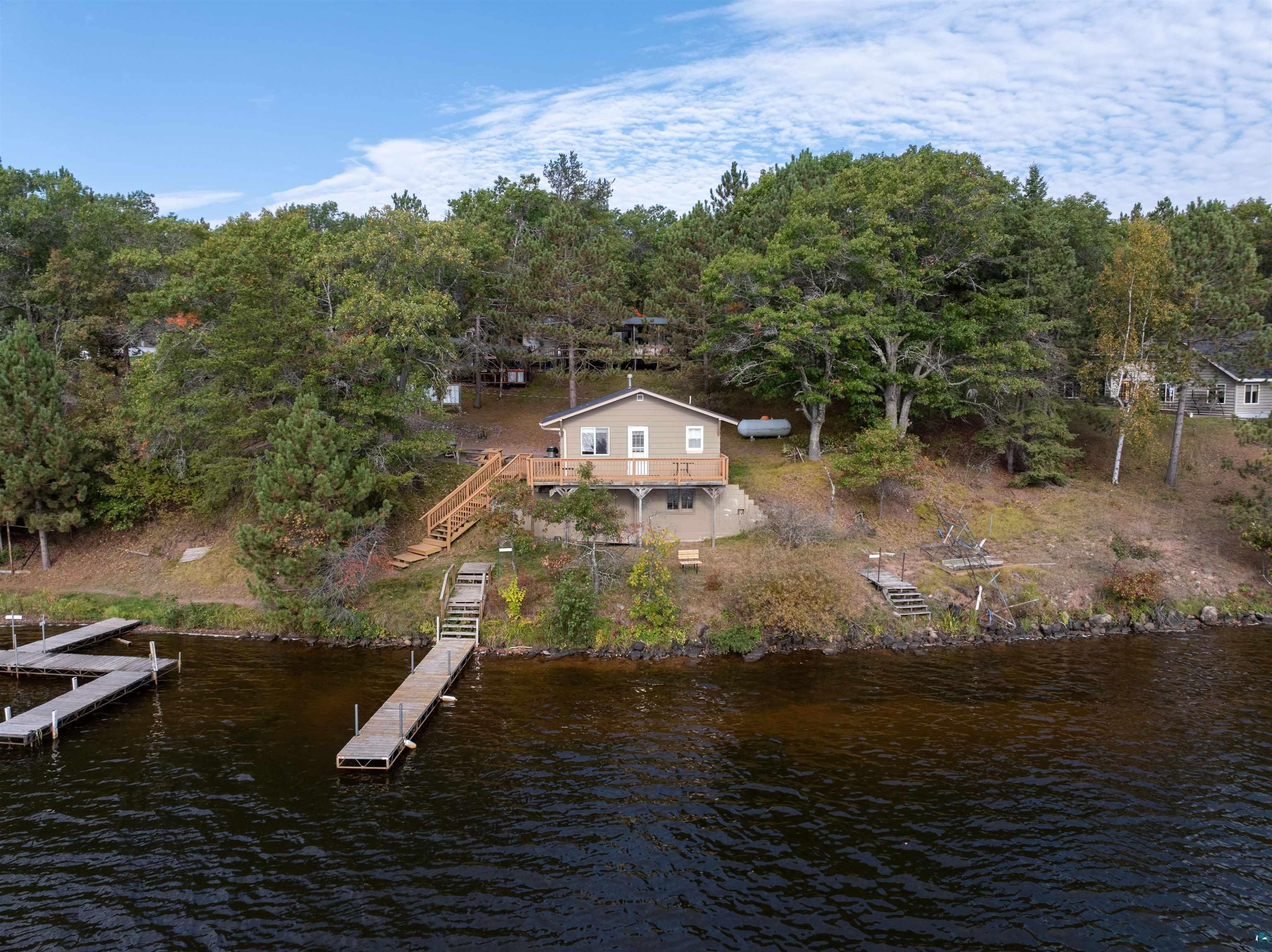 6833 View Point Lodge Road Gordon, WI 54838 - Photo 4 of 40 View from above of property featuring a large body of water