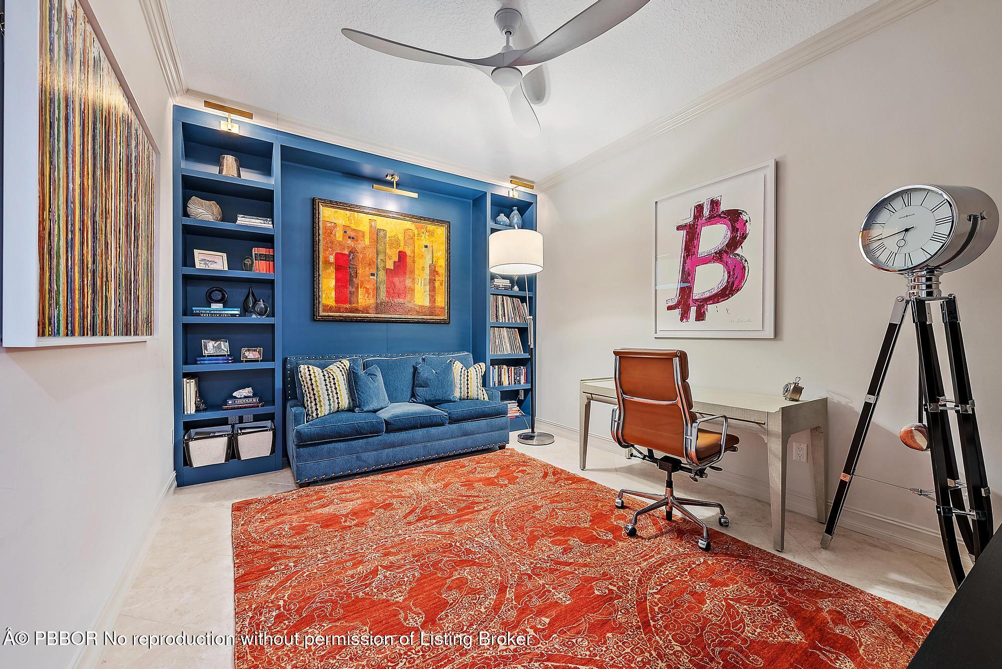 701 South Olive Avenue, Unit 2012 PH West Palm Beach, FL 33401 - Photo 15 of 42 a bedroom with furniture and a flat screen tv