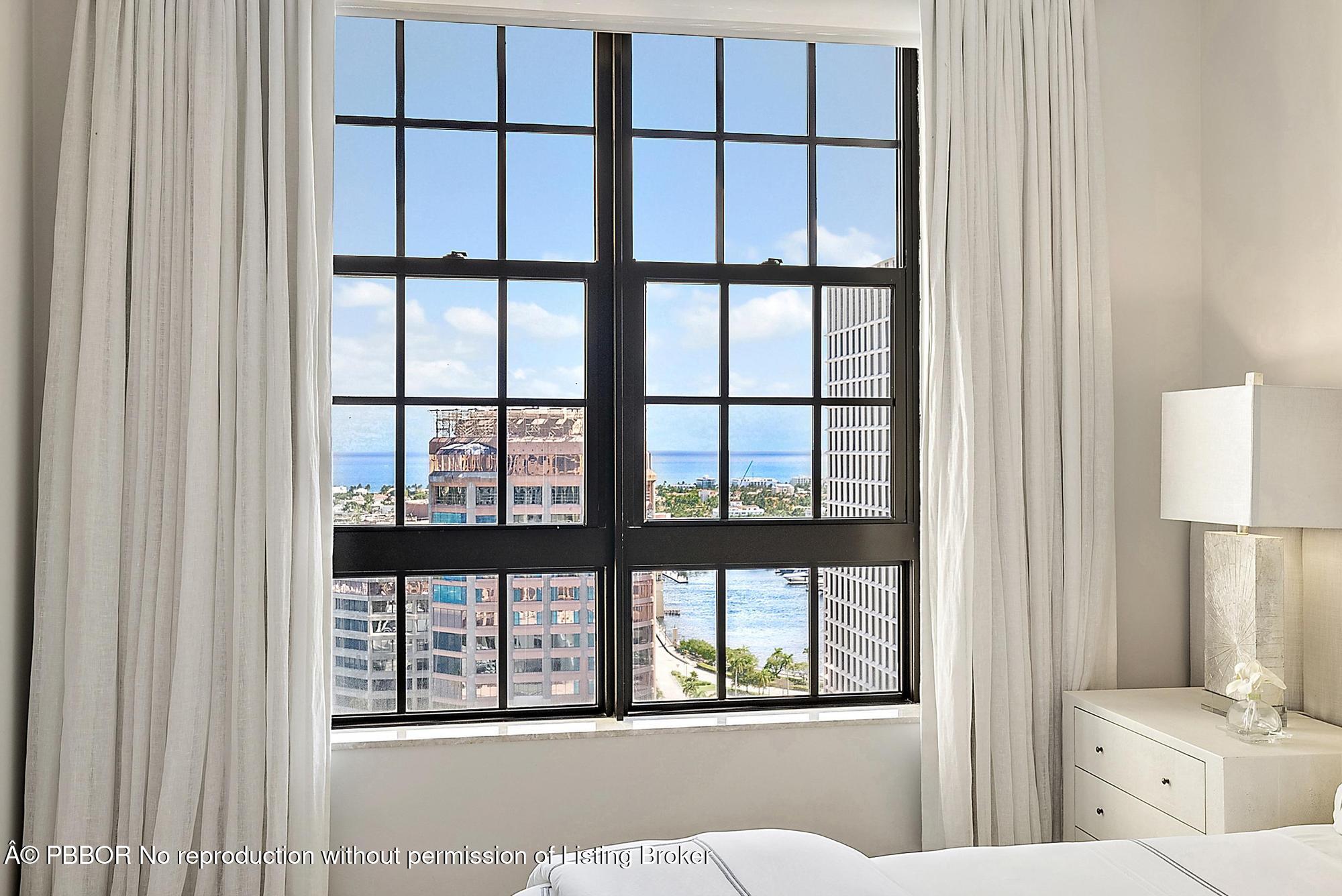 701 South Olive Avenue, Unit 2012 PH West Palm Beach, FL 33401 - Photo 23 of 42 a room with window and front door