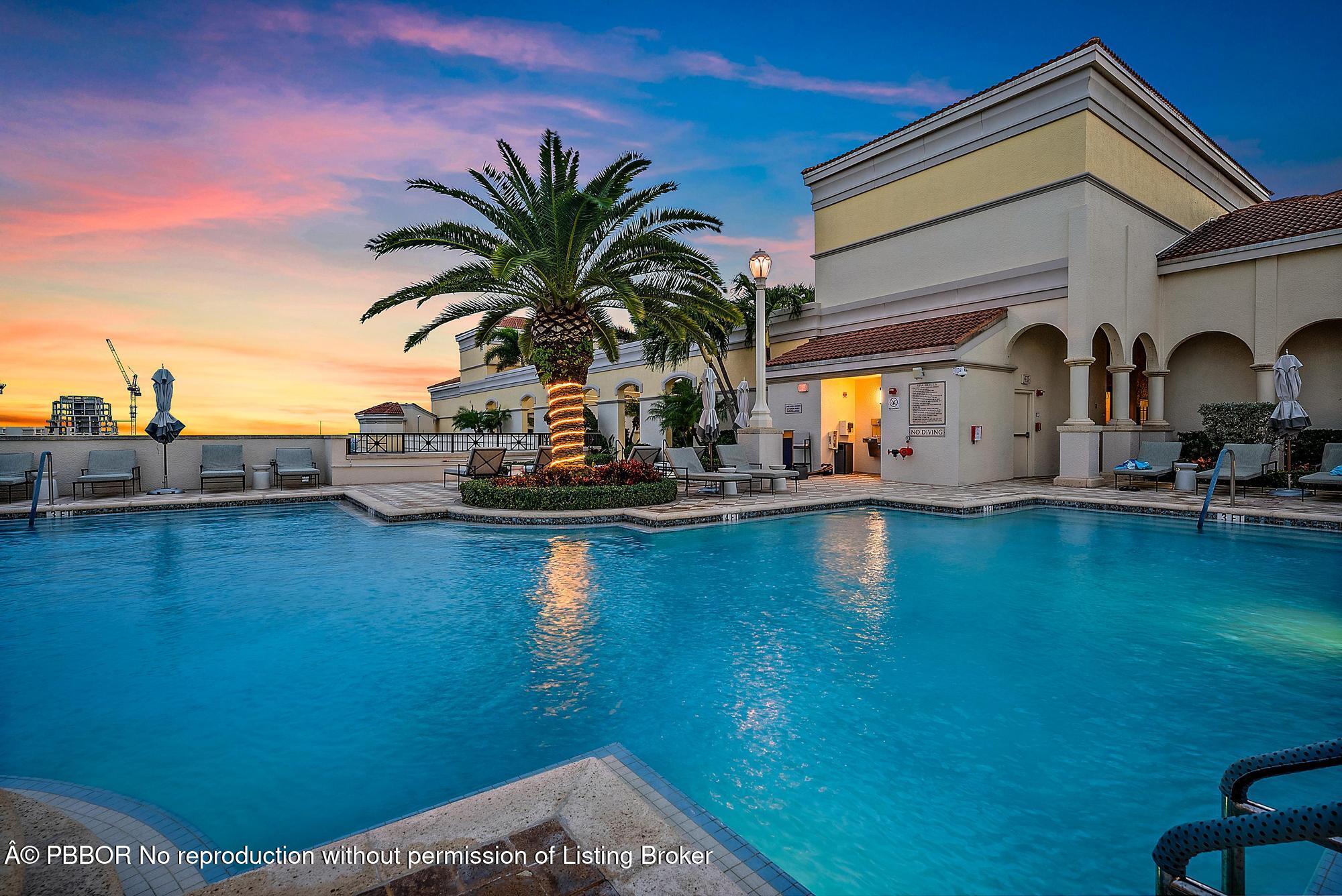 701 South Olive Avenue, Unit 2012 PH West Palm Beach, FL 33401 - Photo 27 of 42 a view of a swimming pool with outdoor seating