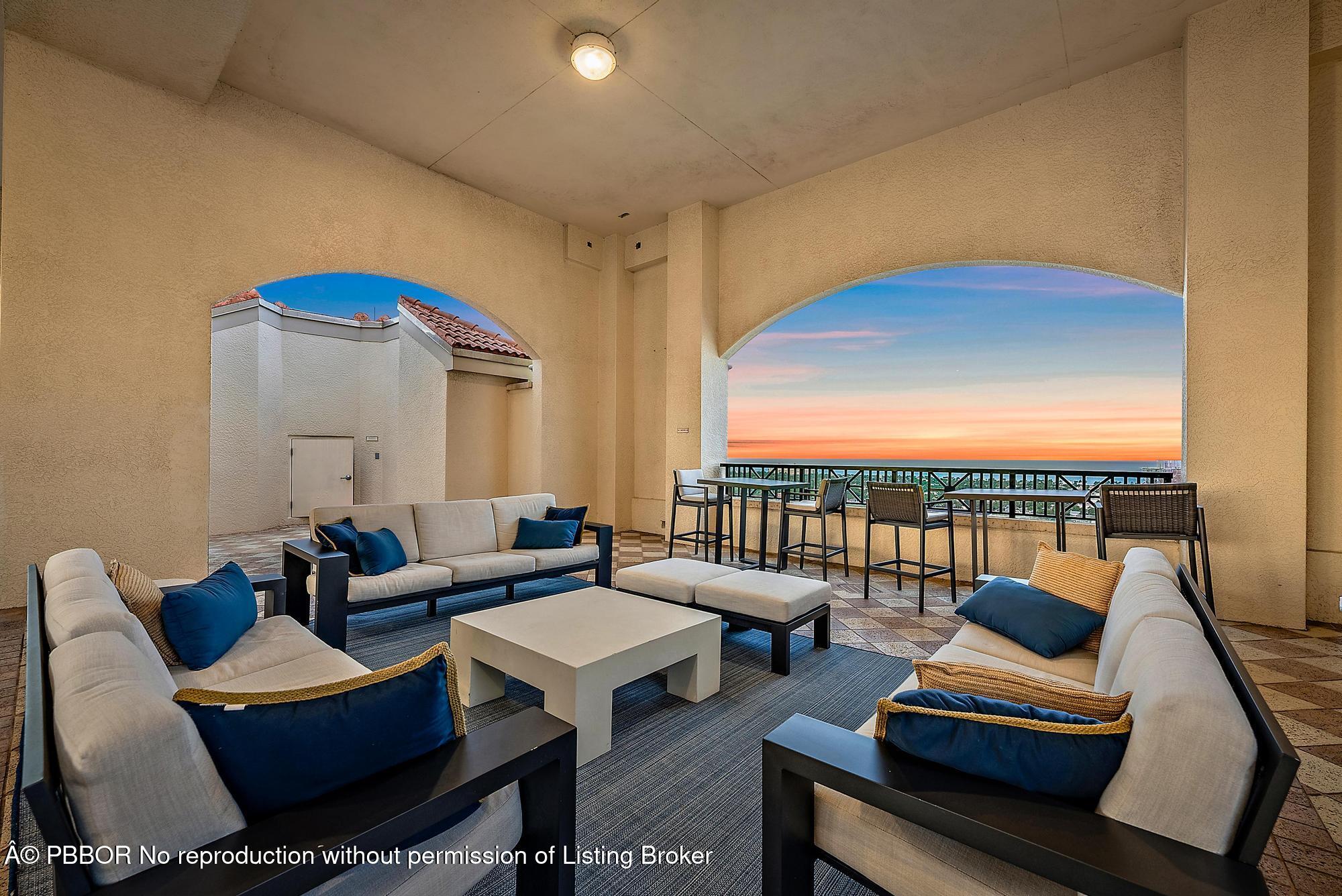 701 South Olive Avenue, Unit 2012 PH West Palm Beach, FL 33401 - Photo 31 of 42 a living room with furniture and a view of balcony
