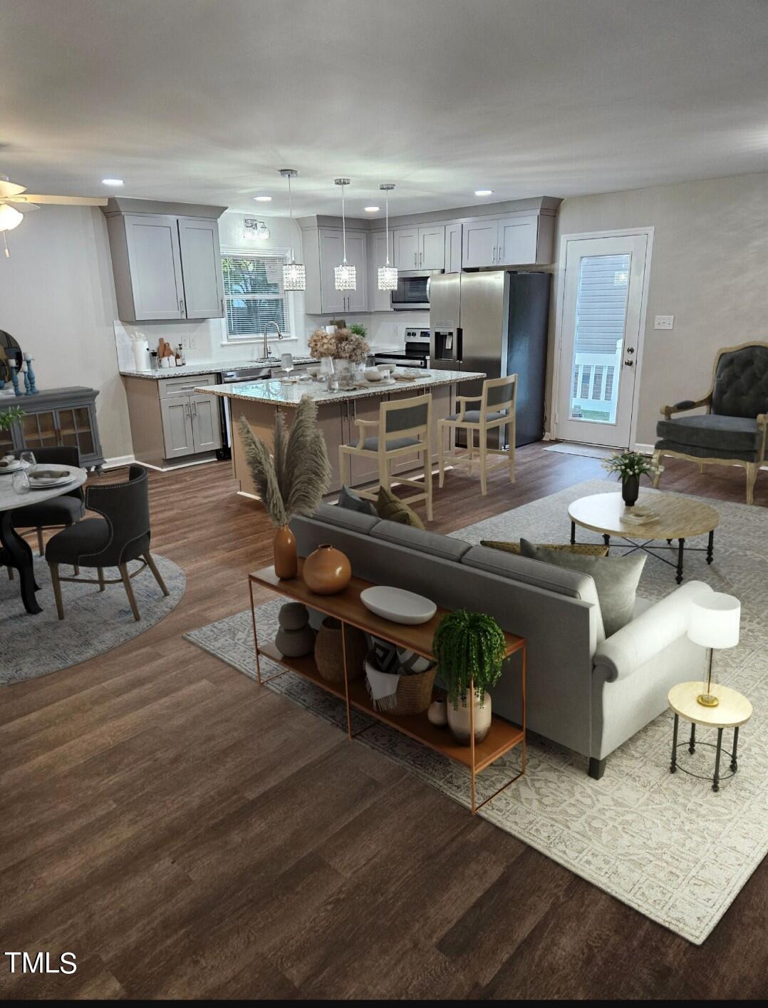 1629 Beverly Road Rocky Mount, NC 27801 - Photo 2 of 13 a kitchen with stainless steel appliances granite countertop a stove and a refrigerator