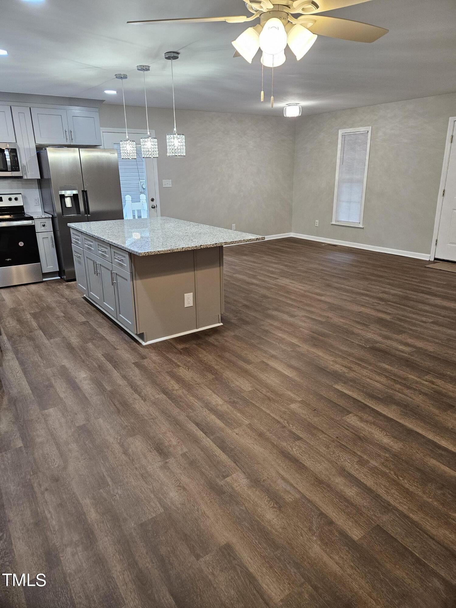 1629 Beverly Road Rocky Mount, NC 27801 - Photo 3 of 13 a large kitchen with stainless steel appliances a large counter top