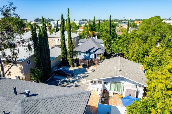 a view of houses with an outdoor space and seating area