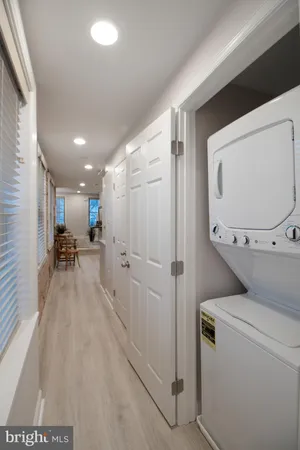 a view of a storage & utility room with wooden floor