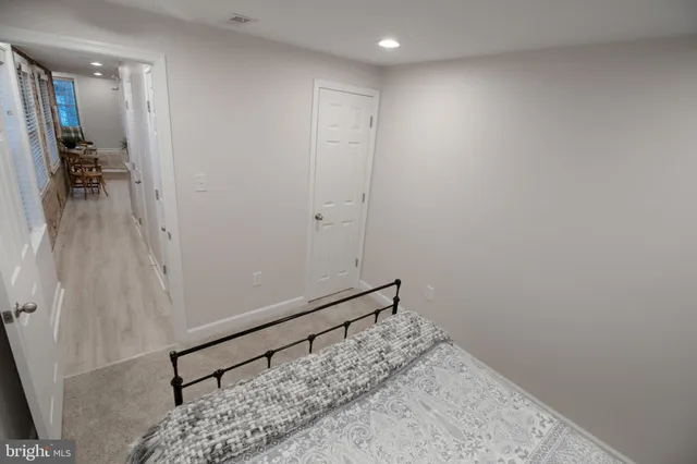 a bathroom with a toilet a sink and a shower