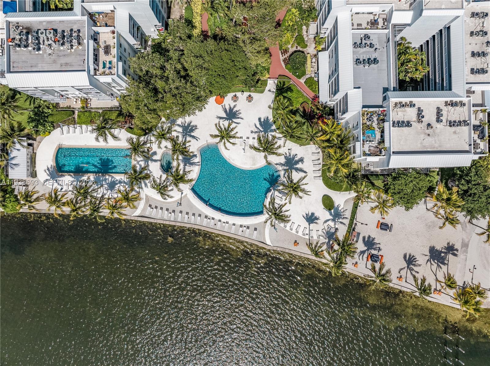 680 Northeast 64th Street, Unit APH2 Miami, FL 33138 - Photo 23 of 24 a front view of a house with a garden