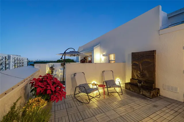 a view of a chairs and tables in patio