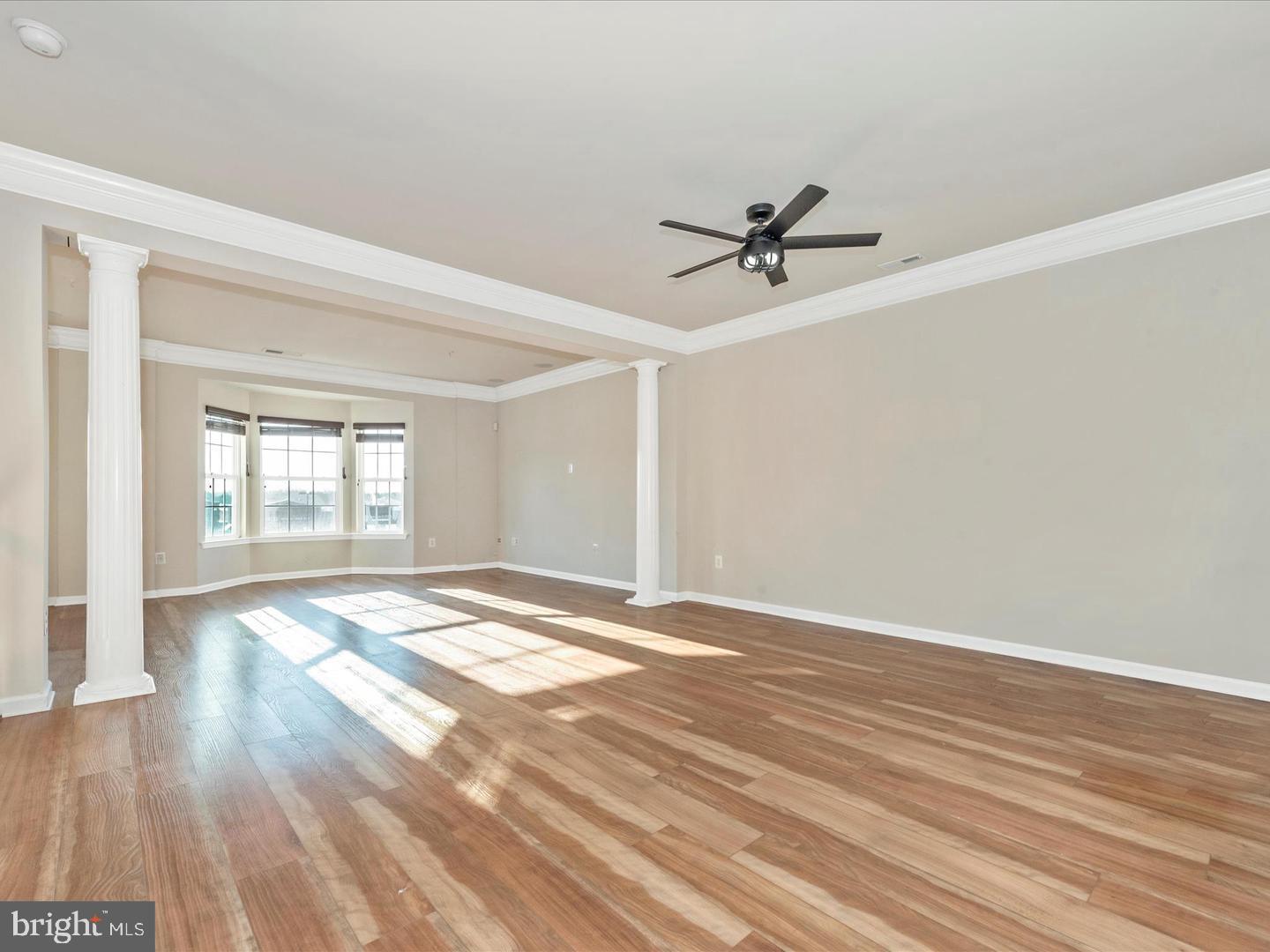 208 B Mill Pond Road Frederick, MD 21701 - Photo 2 of 45 wooden floor in an empty room with a window
